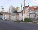 Terreno com Galpão e 3 casas