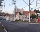 Terreno com Galpão e 3 casas