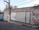 Terreno com Galpão e 3 casas