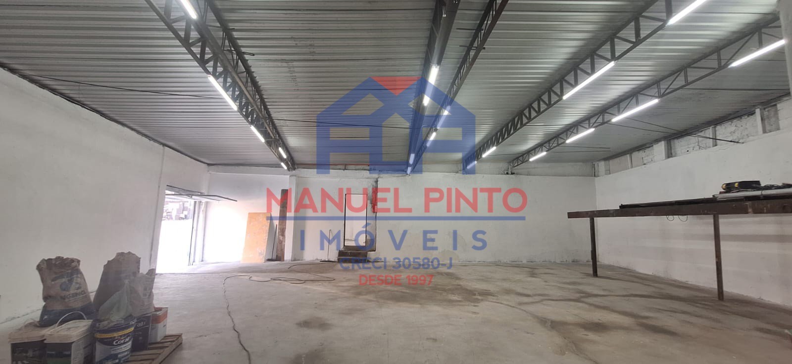 Terreno com 374m com 4 construções