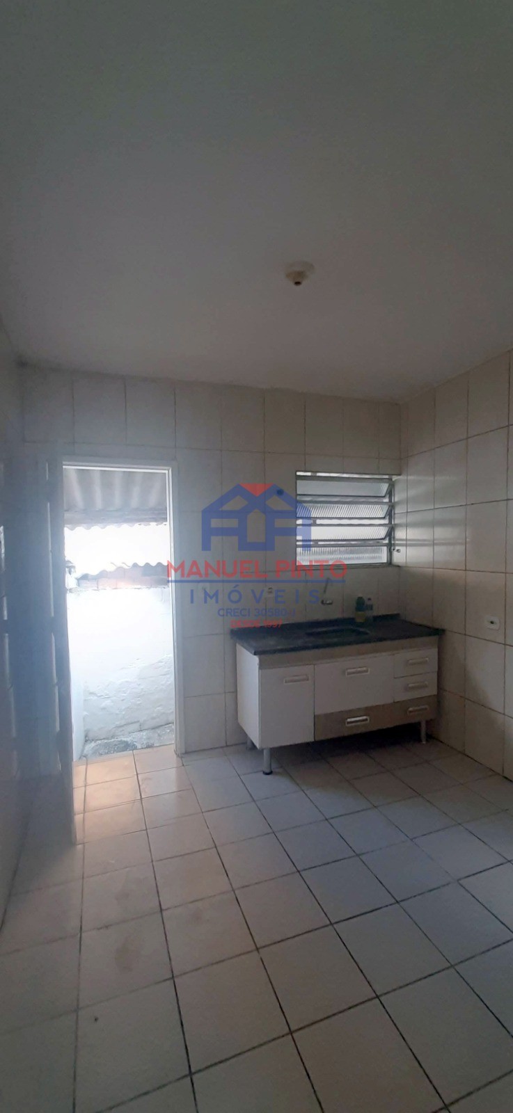 Terreno com 3 casas