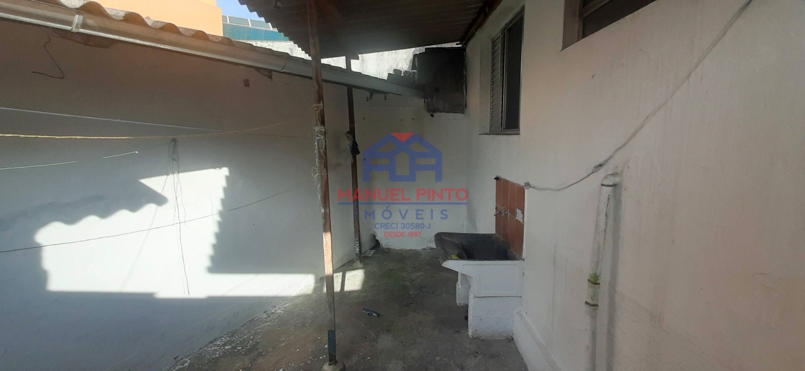 Terreno com 3 casas
