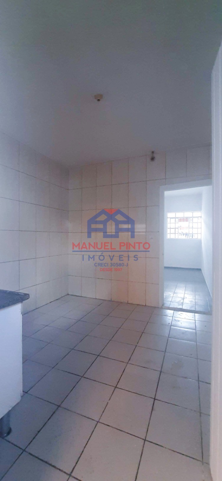 Terreno com 3 casas