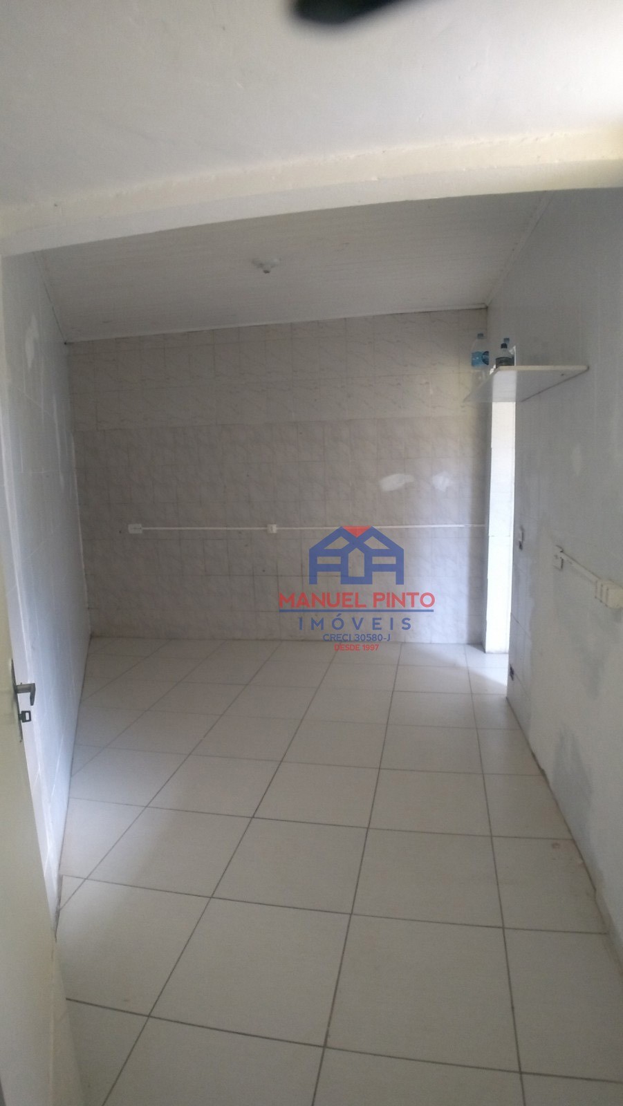 Terreno com 3 casas