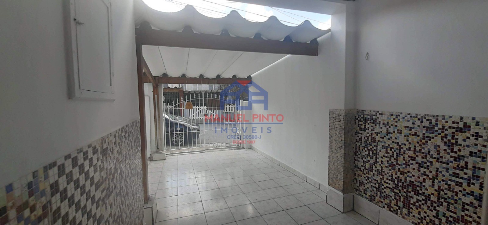 Terreno com 3 casas